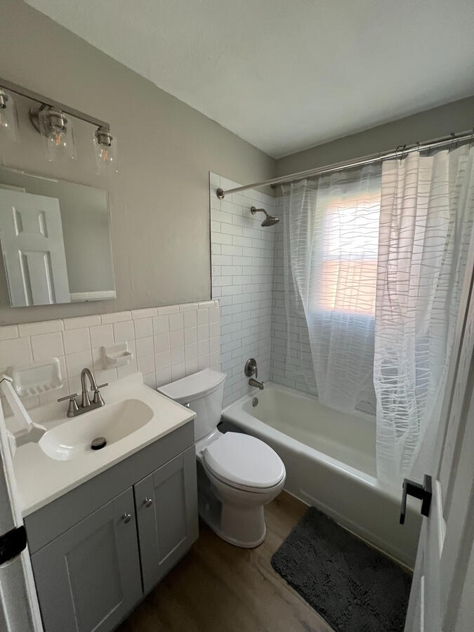 Clean, updated bathroom shared by crew in each apartment.